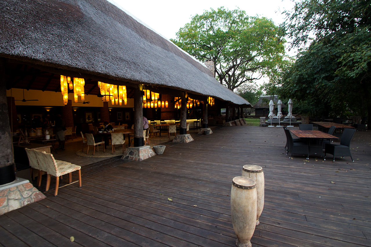 Thatched dining area and terrace at Mfuwe Lodge, Zambia