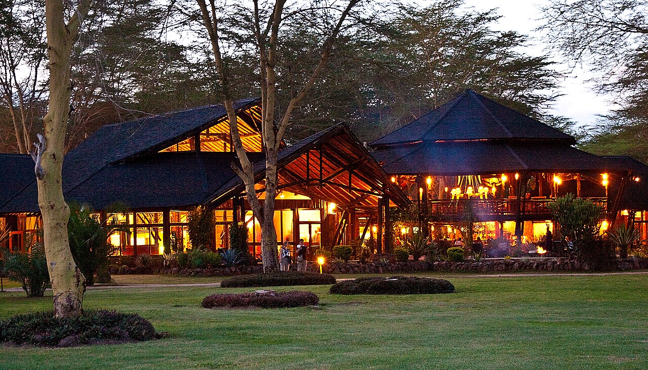Main building of Ol Tukai Lodge illuminated at night, Amboseli, Kenya